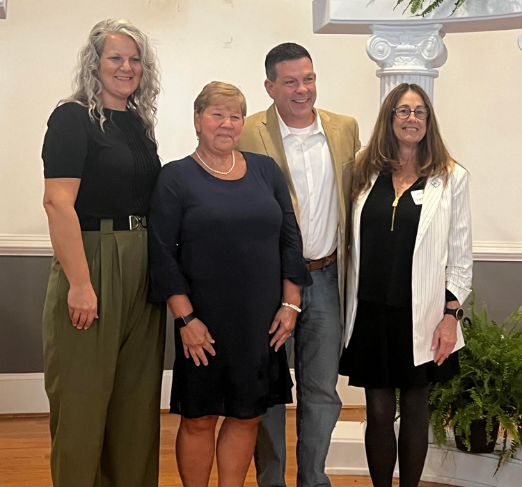 Sharon Mohrmann with the School Board - Melissa Anderson, Jack Rickett, and Sandy Harrington