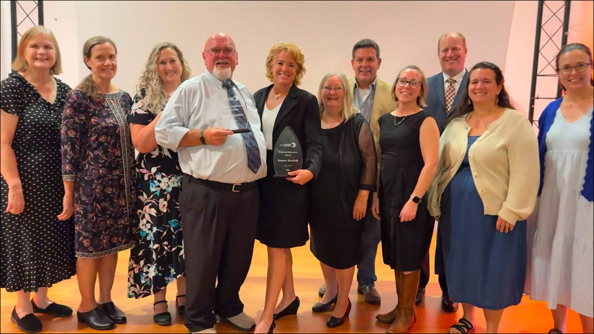 Mr. Hawkins and Mrs. Marshall alongside several past OCEF grant recipients, Dr. Hornick, and school board members Mrs. Dawson, Mrs. Whittington, and Mr. Rickett.
